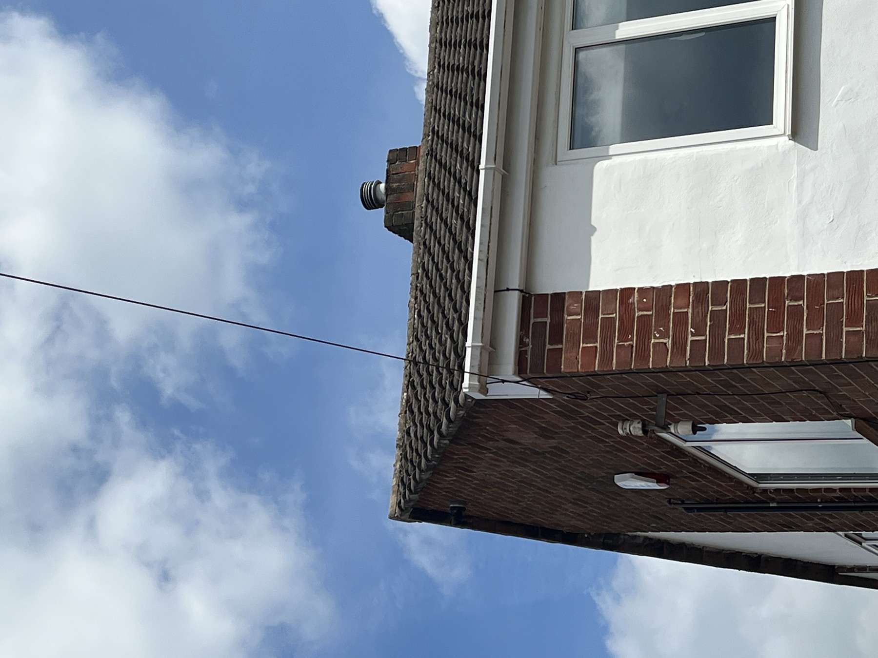 Existing roofline and chimney of the property before the extension began
