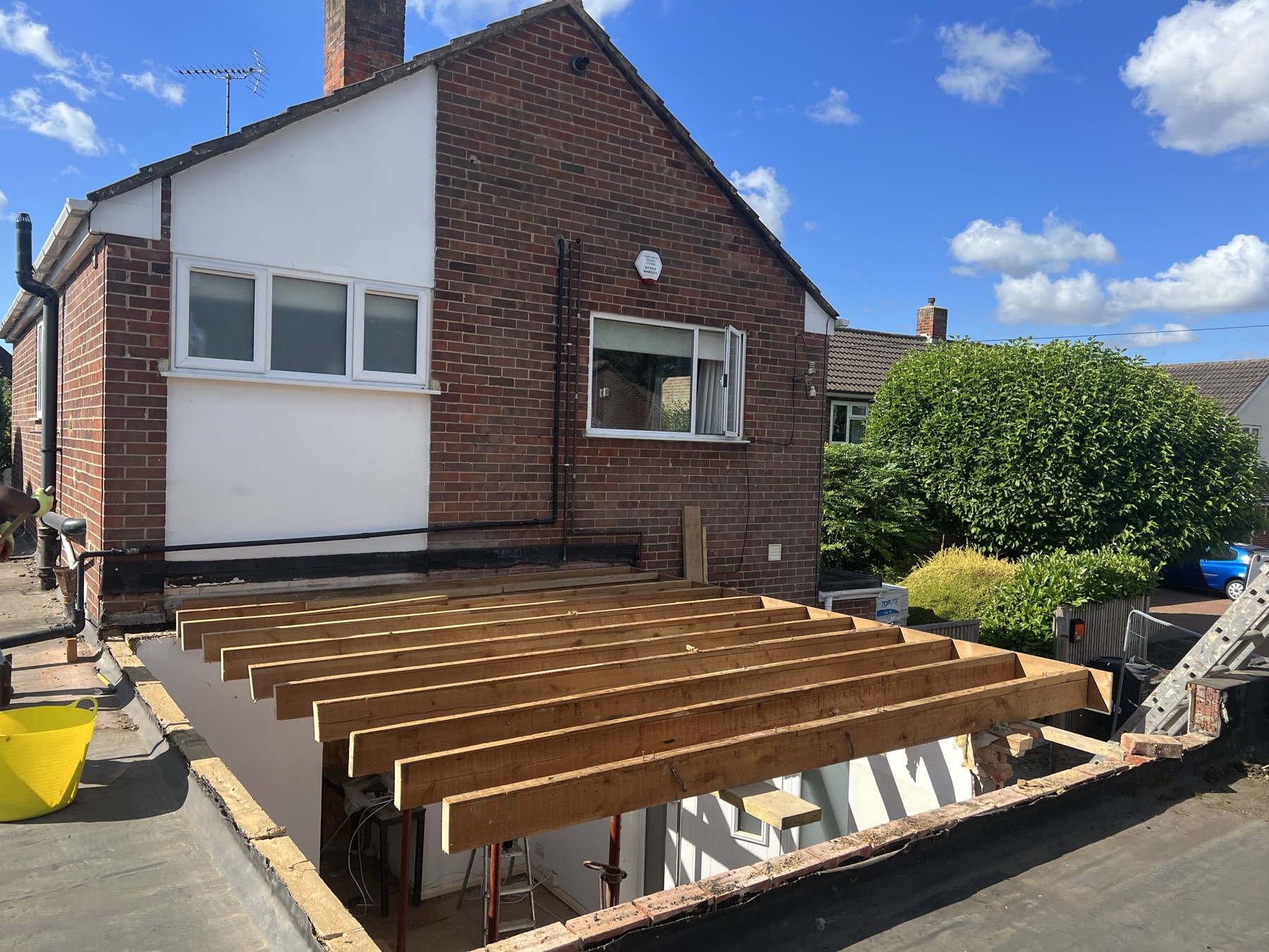 New floor joists and brick base laid for the single storey portion of the extension