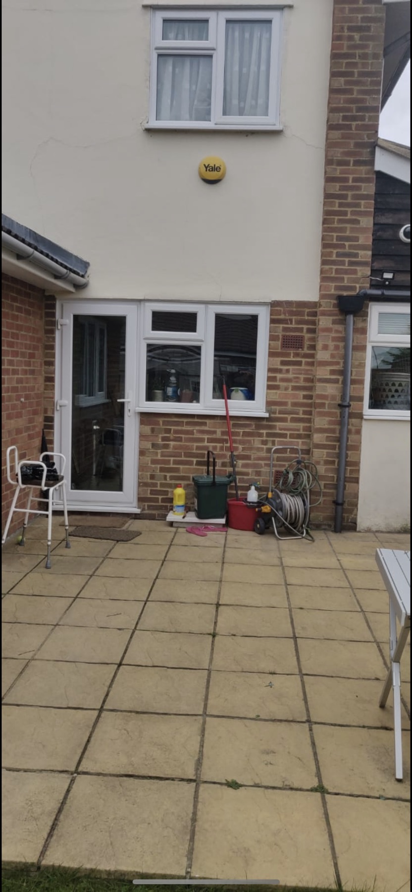 Existing rear extension and patio doors before works began
