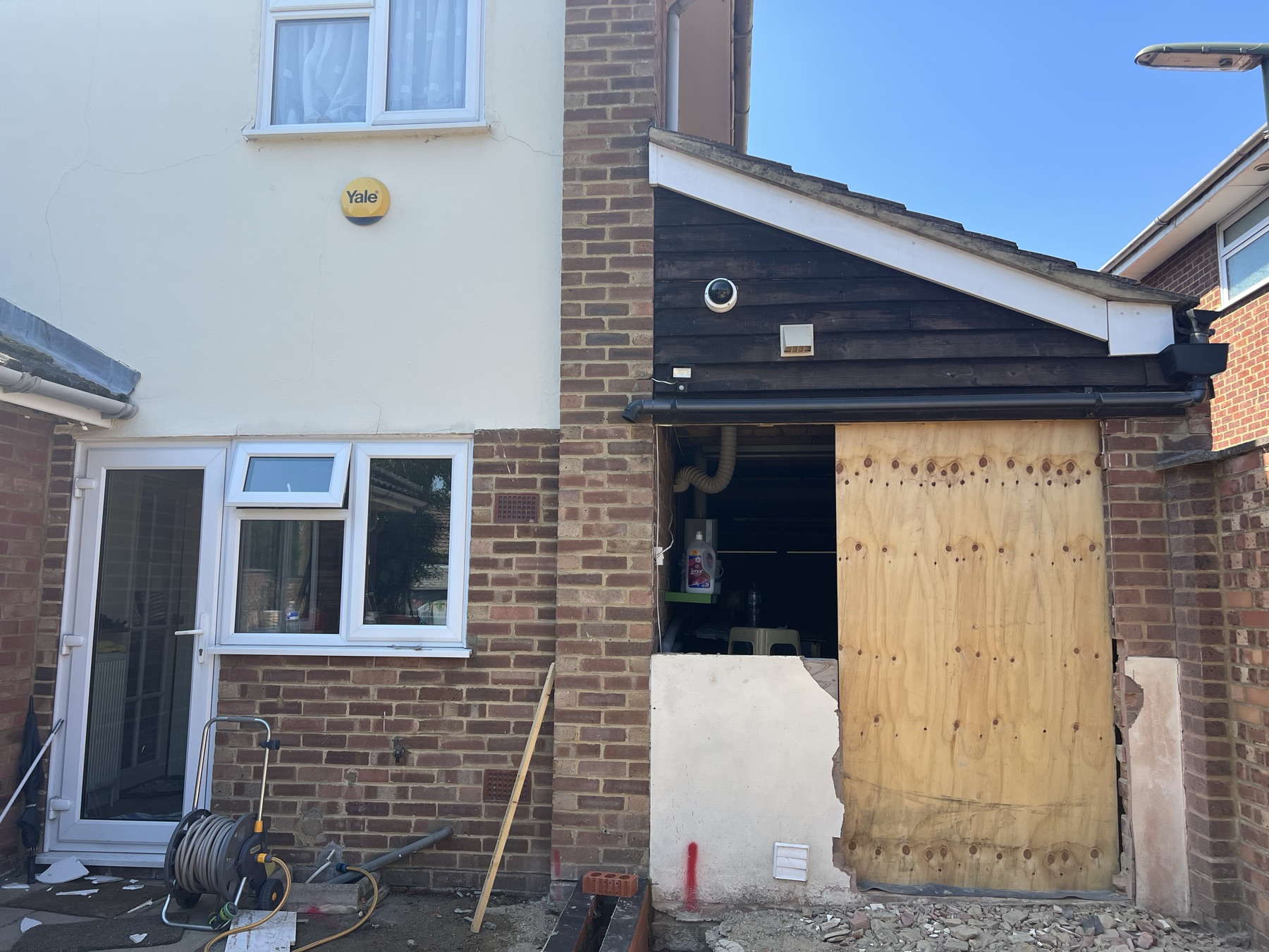 New foundations for the rear extension being poured, with the existing patio broken out