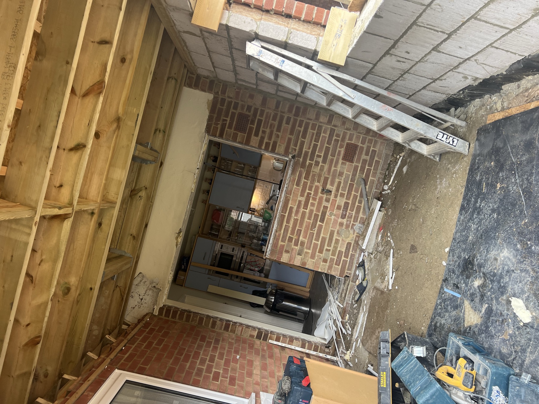 New structural opening through to the kitchen, with the brickwork reveal formed as the extension gets underway